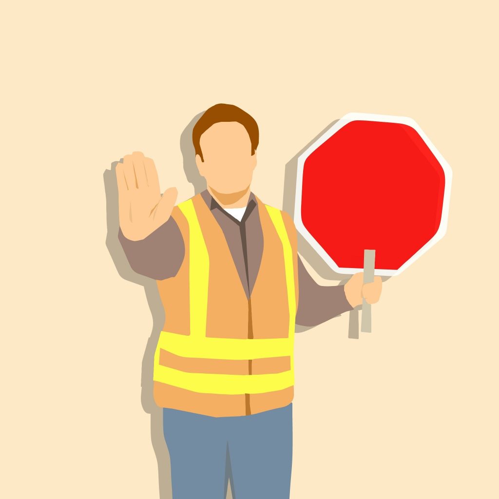 Cartoon man with stop sign signalling to stop