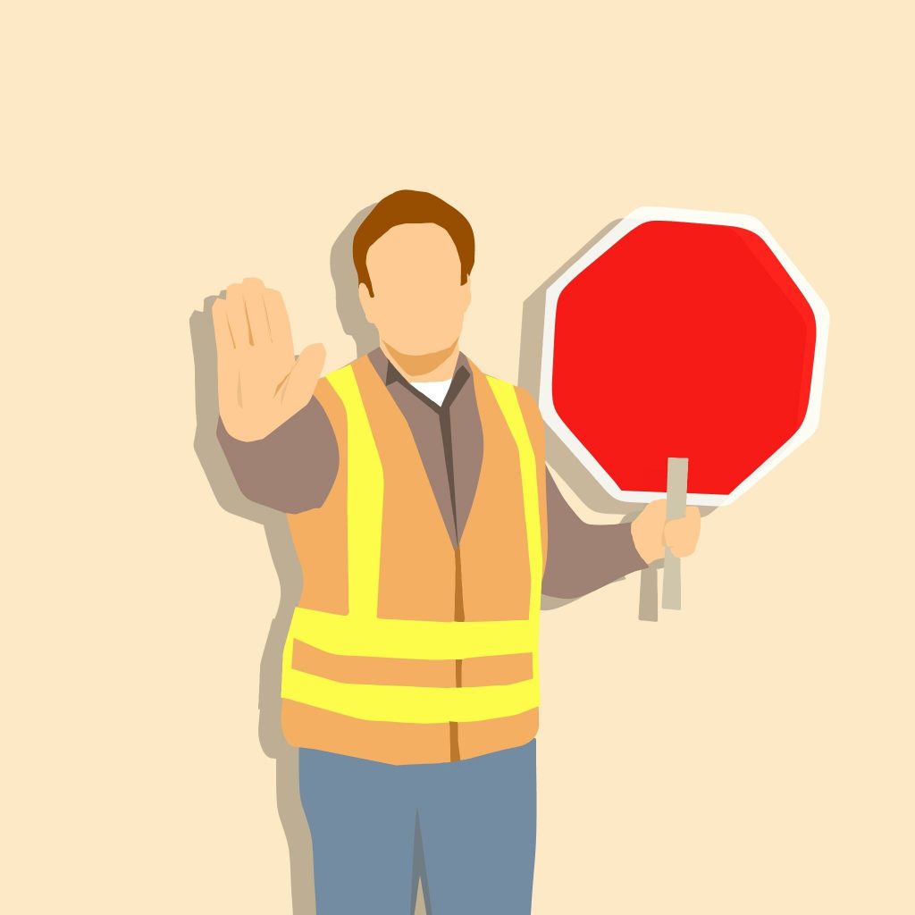 Cartoon man with stop sign signalling to stop