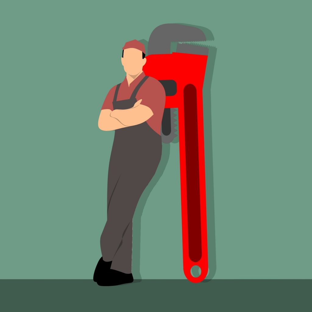 Cartoon plumber leaning against large wrench