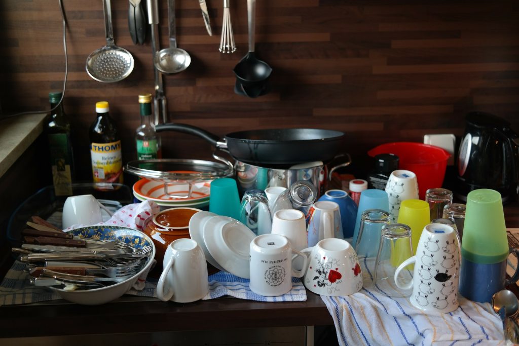 Kitchen counter covered in washing up