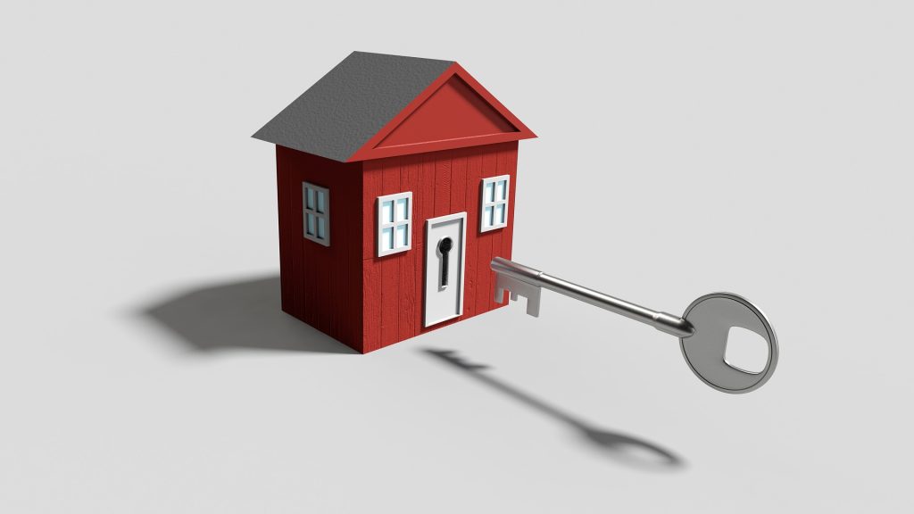 Cartoon house with large door key