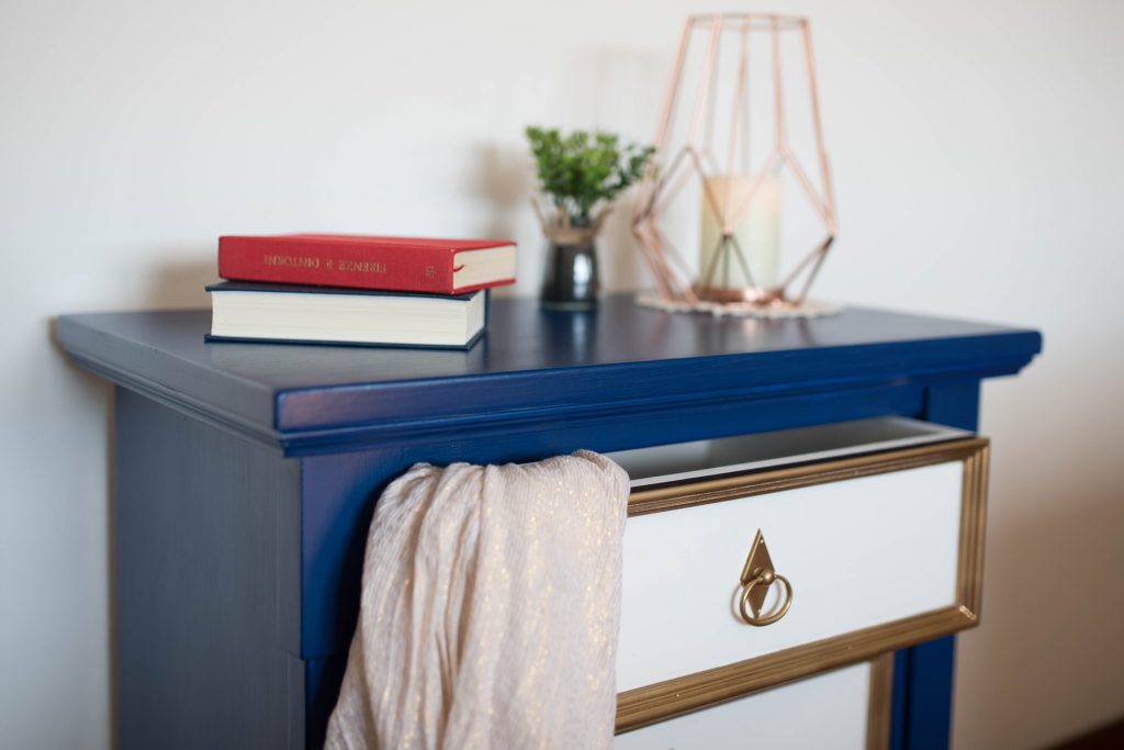 Blue side table with open drawer