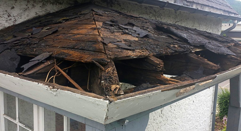 Rotten roof with holes