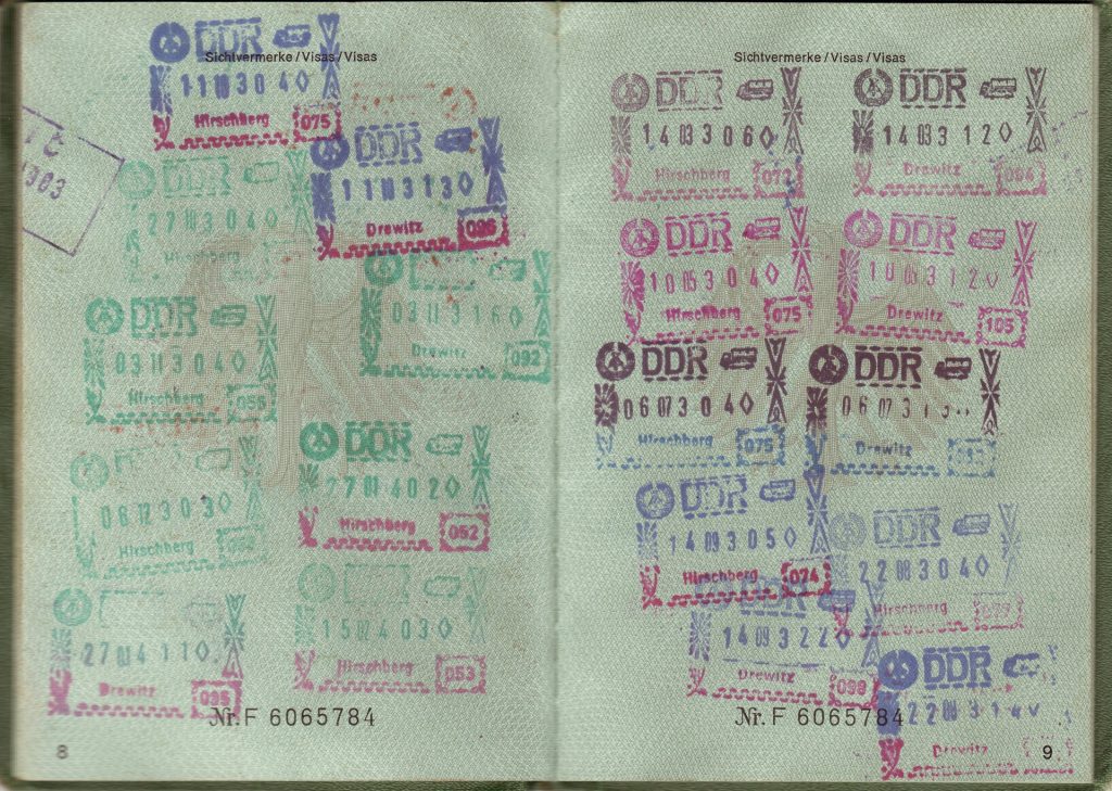 Passport pages stamped with entry visas
