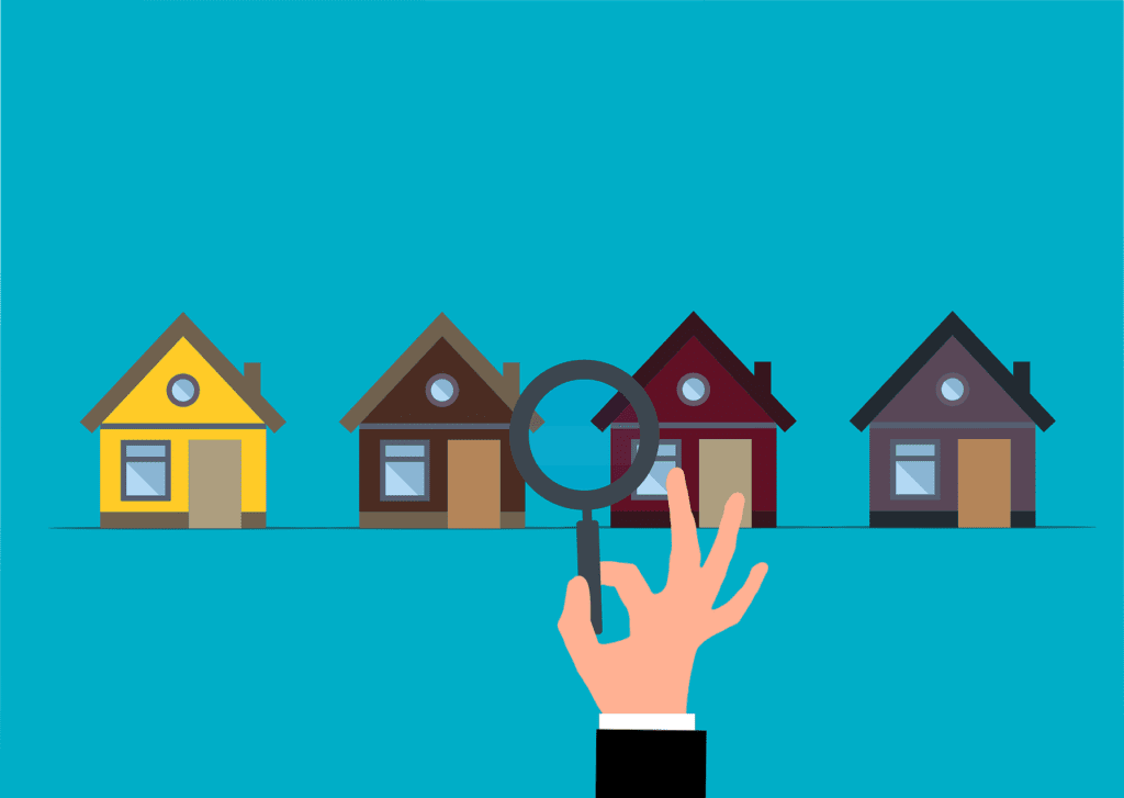 A cartoon magnifying glass looking at some houses